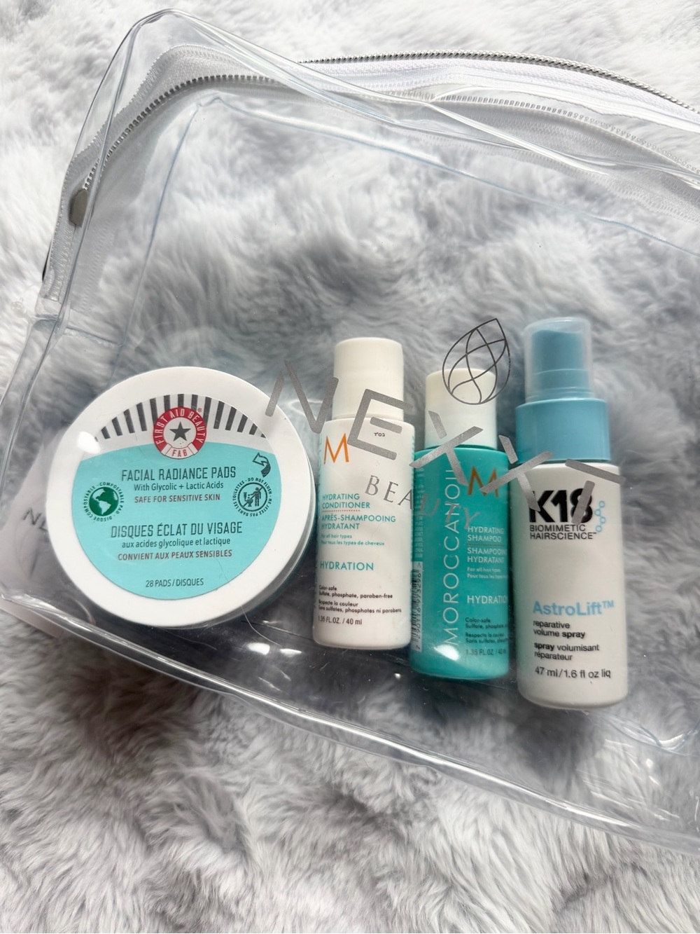 Beauty Bundle — K18 Astrolift, Moroccanoil, First Aid Beauty Facial Pads